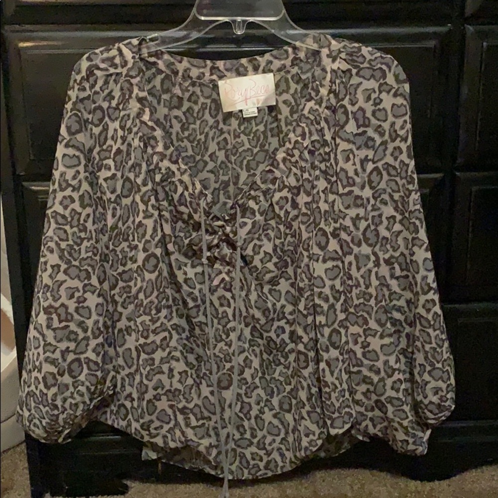 Rory Beca leopard top